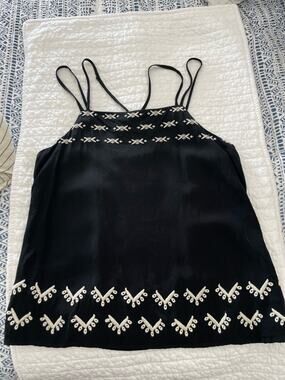 Ann Taylor LOFT cami blouse. Criss Cross straps and white stitch embroidery